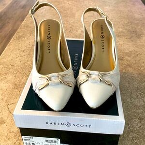 Woman’s white spring/summer shoe.  Never worn outside.